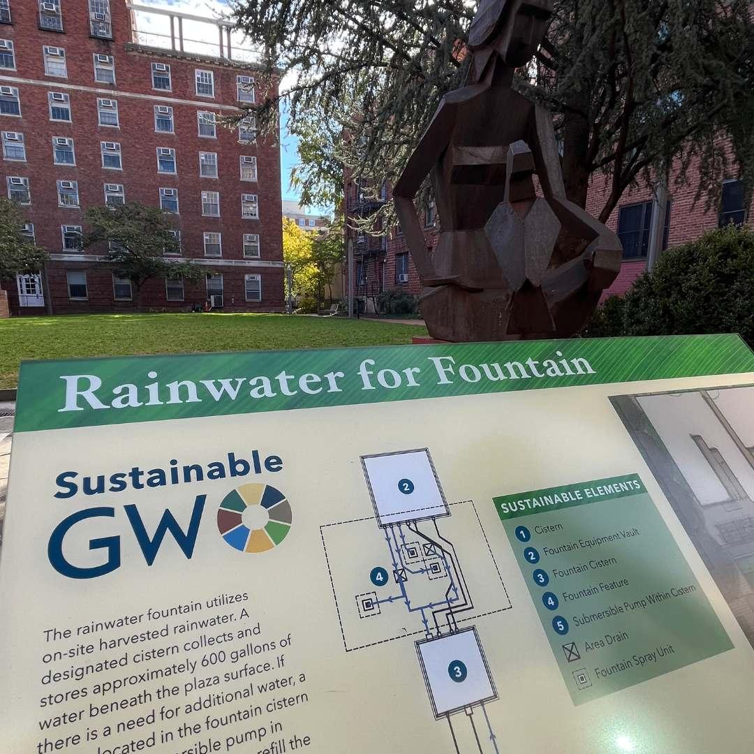 A Sustainable GW informational sign says "rainwater for fountain"